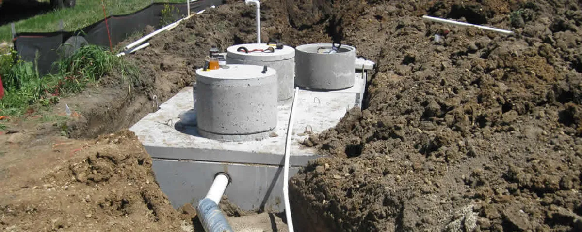 Septic system repair and installation site with tank access ports in Modesto, CA